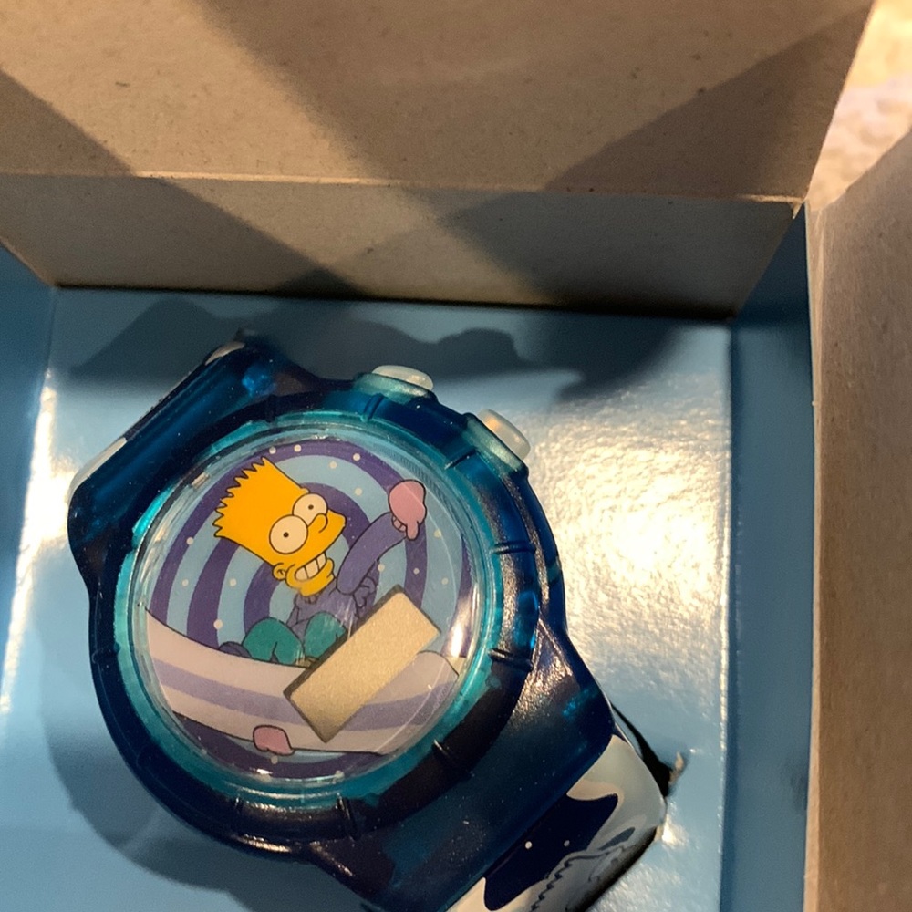 Lot of three THE SIMPSONS digital watches.
